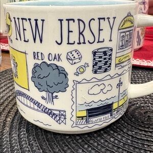 Starbucks, New Jersey mug, with blue and yellow illustration’s.